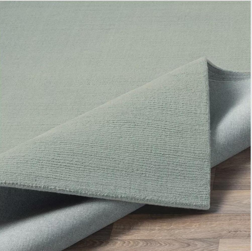 Handwoven Sage Green Area Rug: Earthy Boho Style, solid color rug