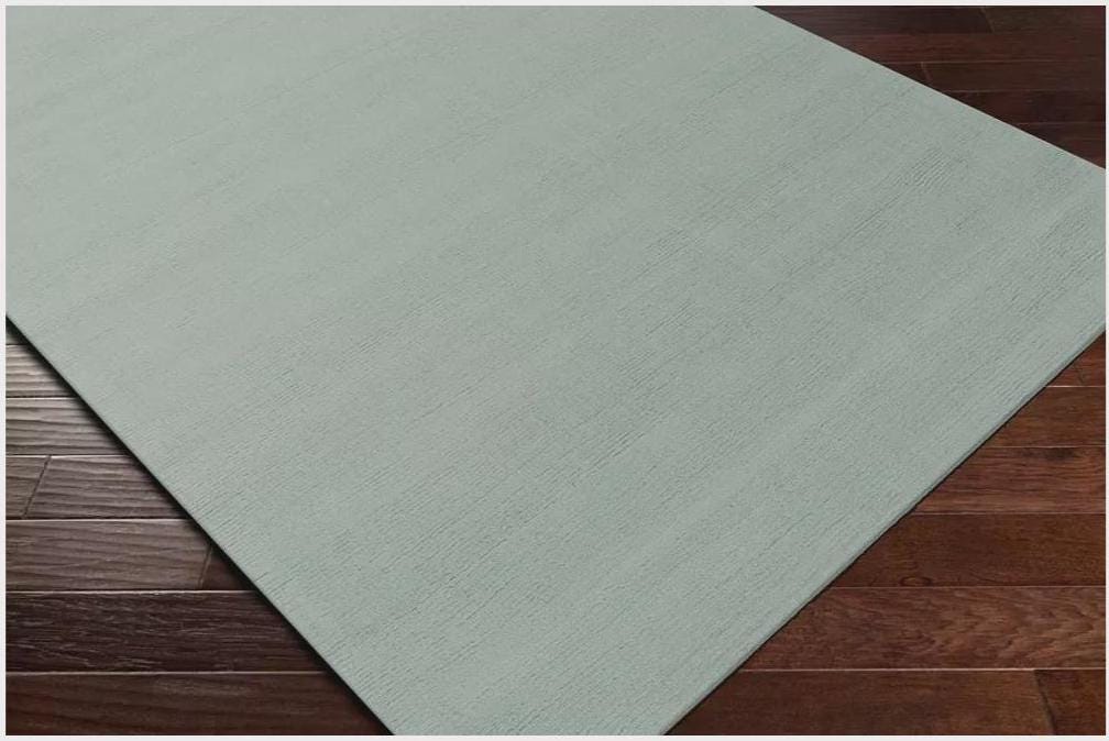 Handwoven Sage Green Area Rug: Earthy Boho Style, solid color rug