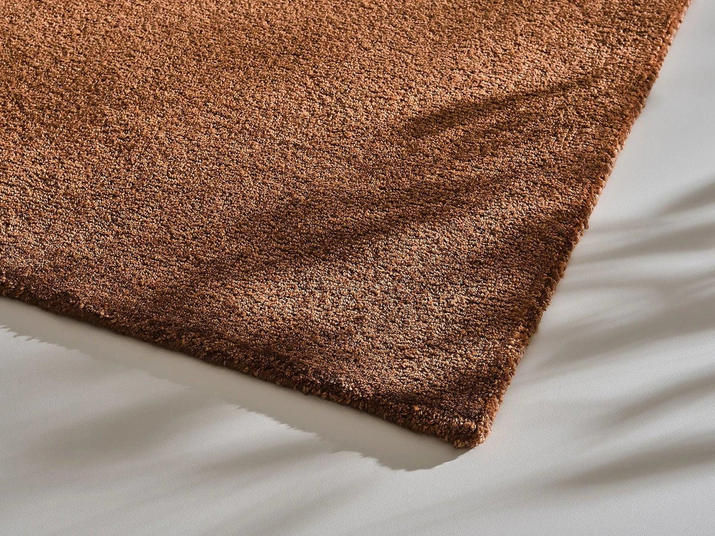 Hand-Tufted New Zealand Wool Rug: Solid Rust Color, Soft Texture