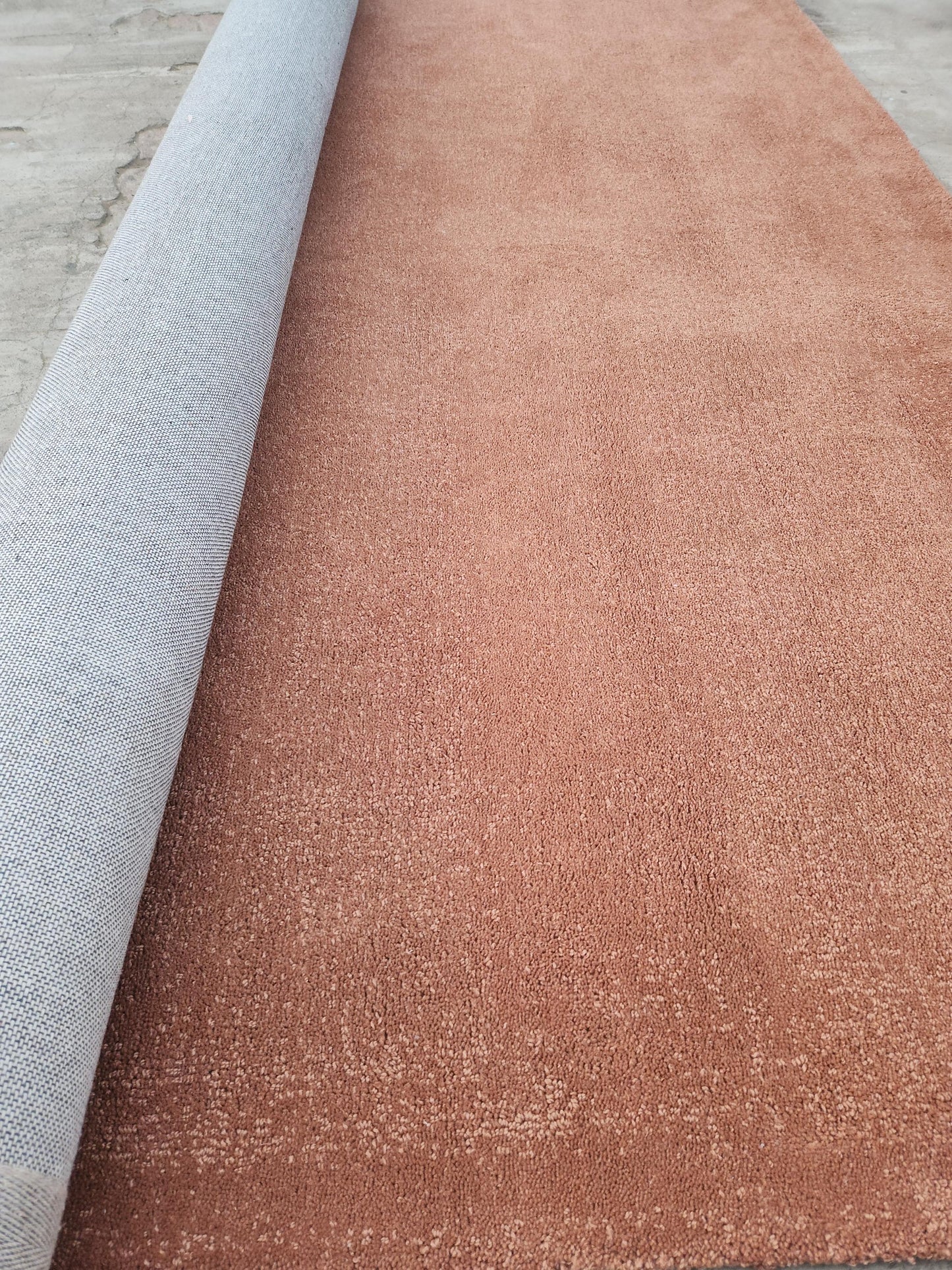 Hand-Tufted New Zealand Wool Rug: Solid Rust Color, Soft Texture